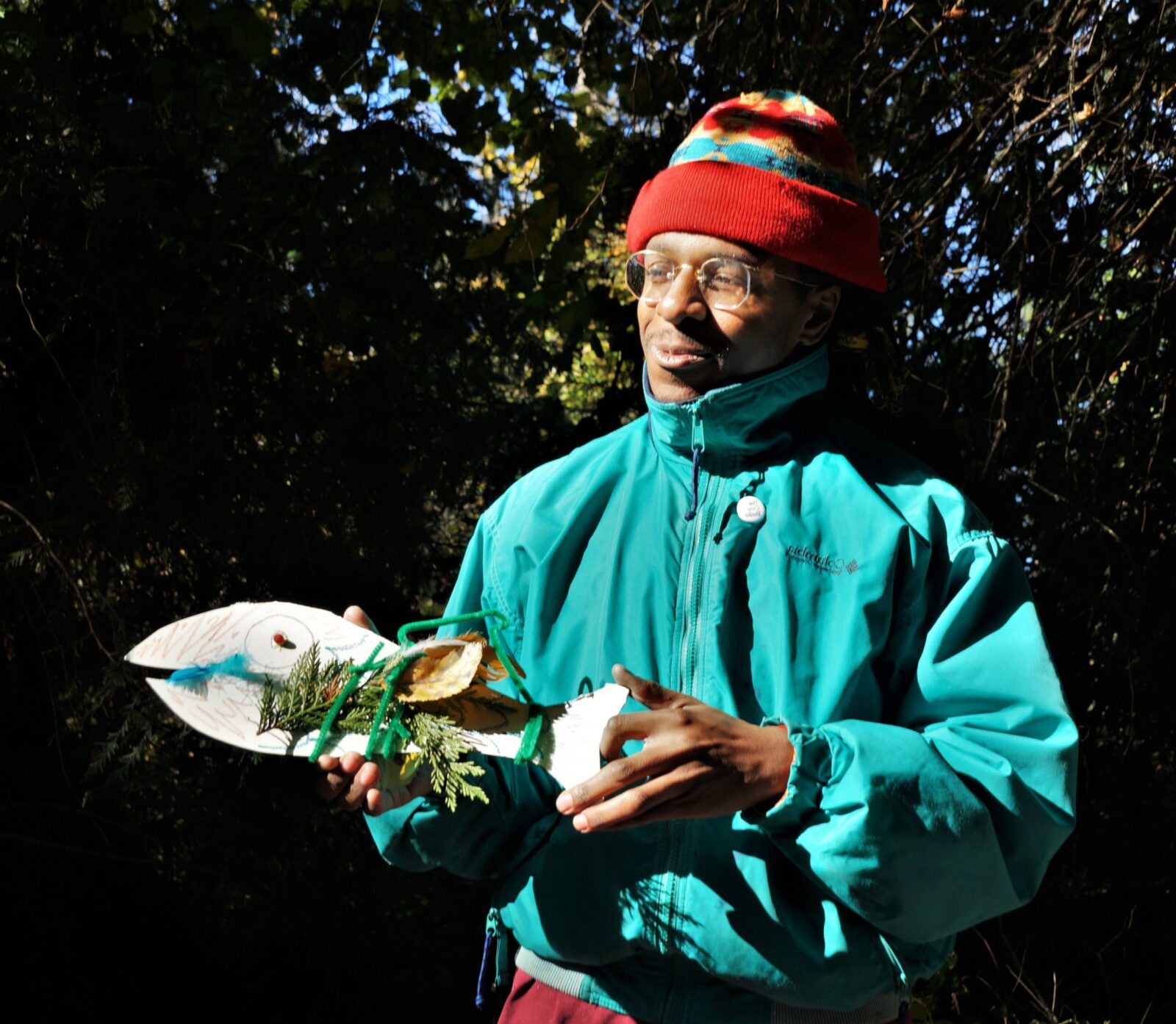 Teaching Artist Ari Glass facilitating an EcoArts in the Woods lesson.