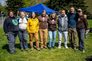 Group photo of Nancy and many former Nature Consortium staff.