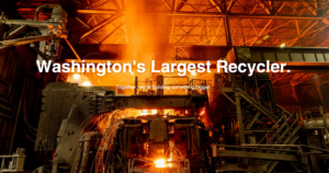 Steel mill in the works with slogan text on top of the photo.